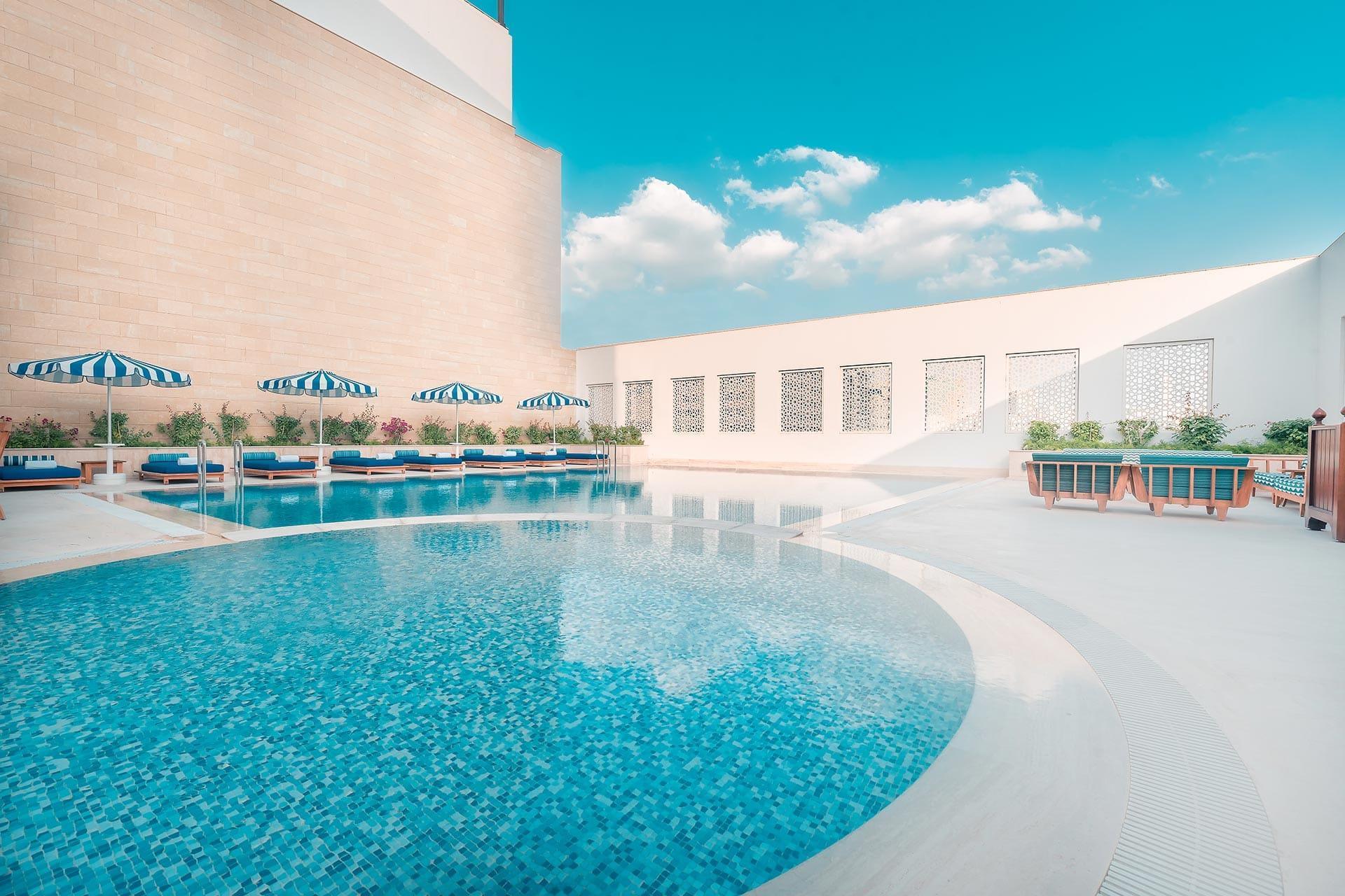 Al Najada Doha Hotel By Tivoli Ngoại thất bức ảnh The pool at the hotel