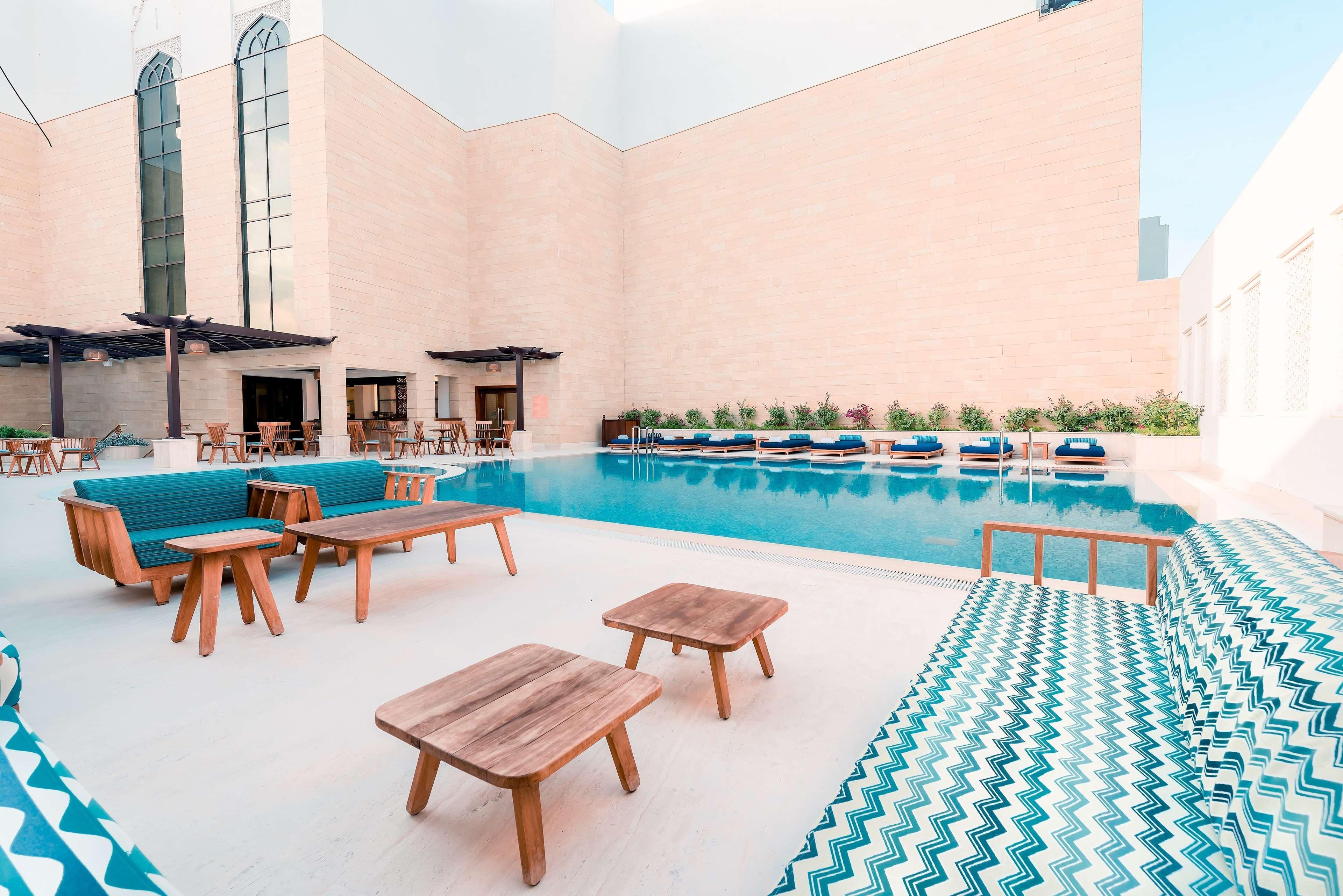 Al Najada Doha Hotel By Tivoli Ngoại thất bức ảnh The pool at the hotel
